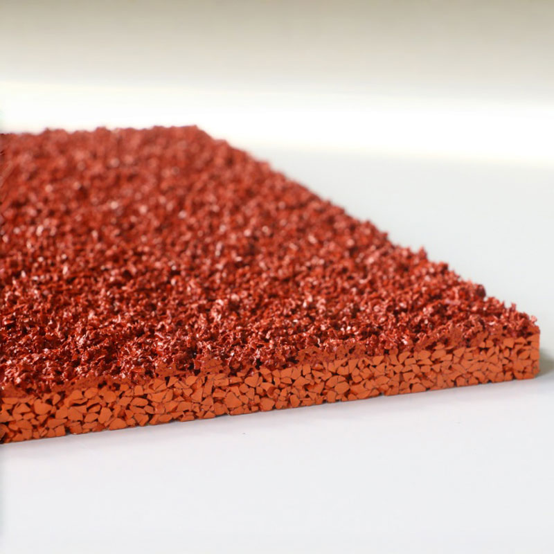 Breathable spray-grained running track