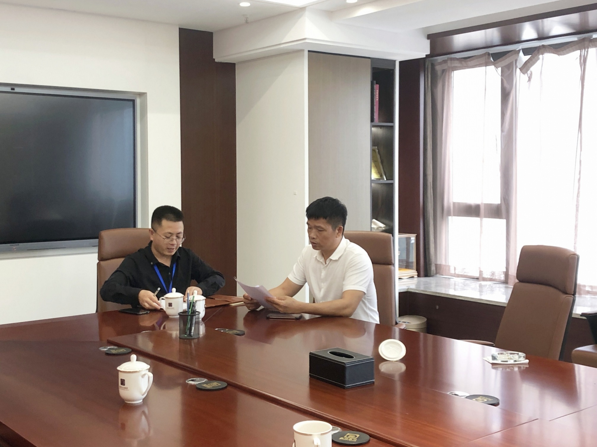 采访商会副会长朱聪元先生