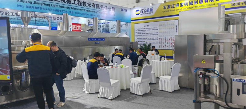 得寶機械攜多款油炸生產線設備亮相第十九屆堅果果干食品展覽會
